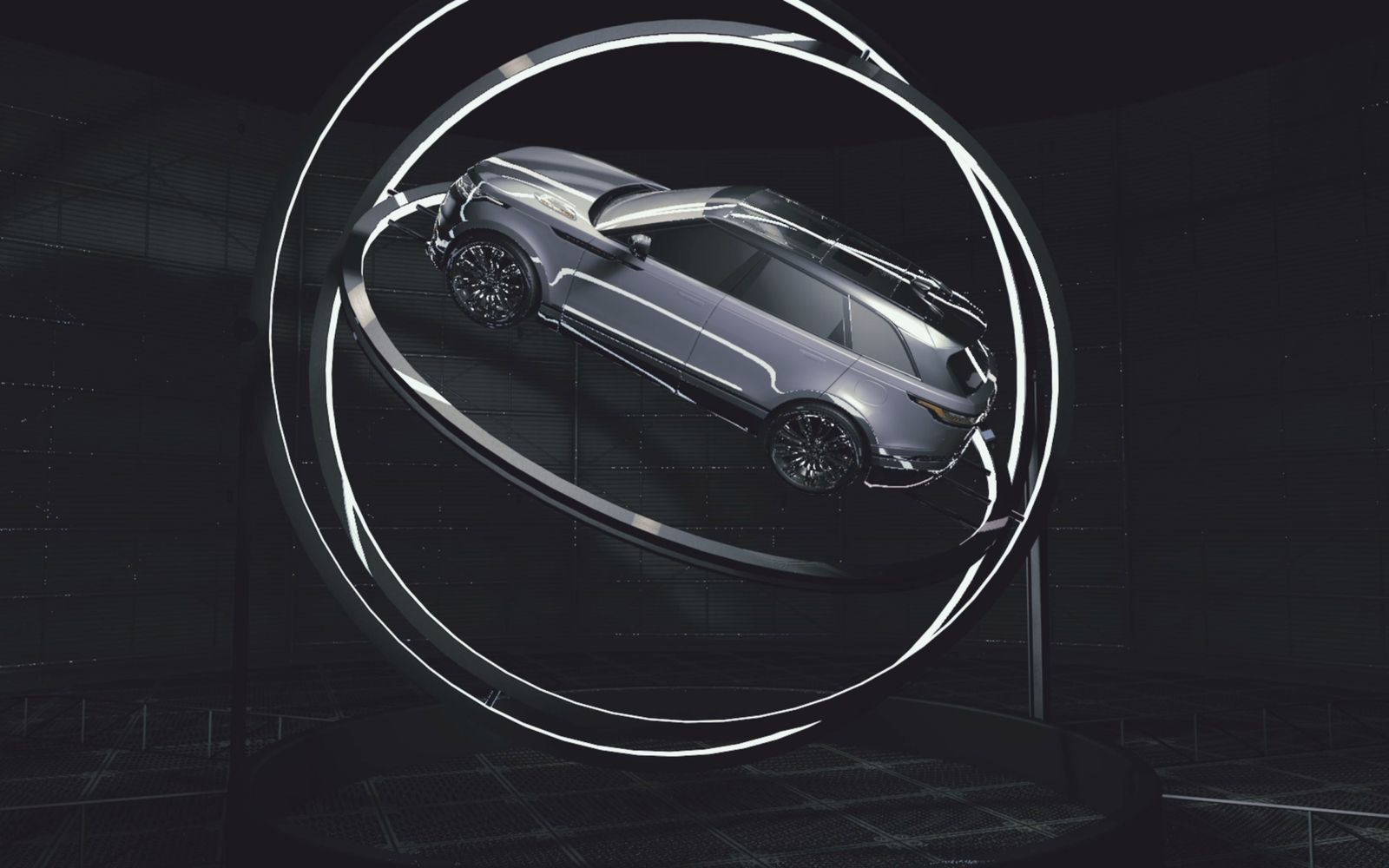 The car seen from above inside the rotating rings